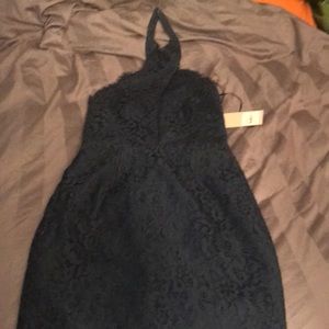 Navy blue cocktail dress with lace detail